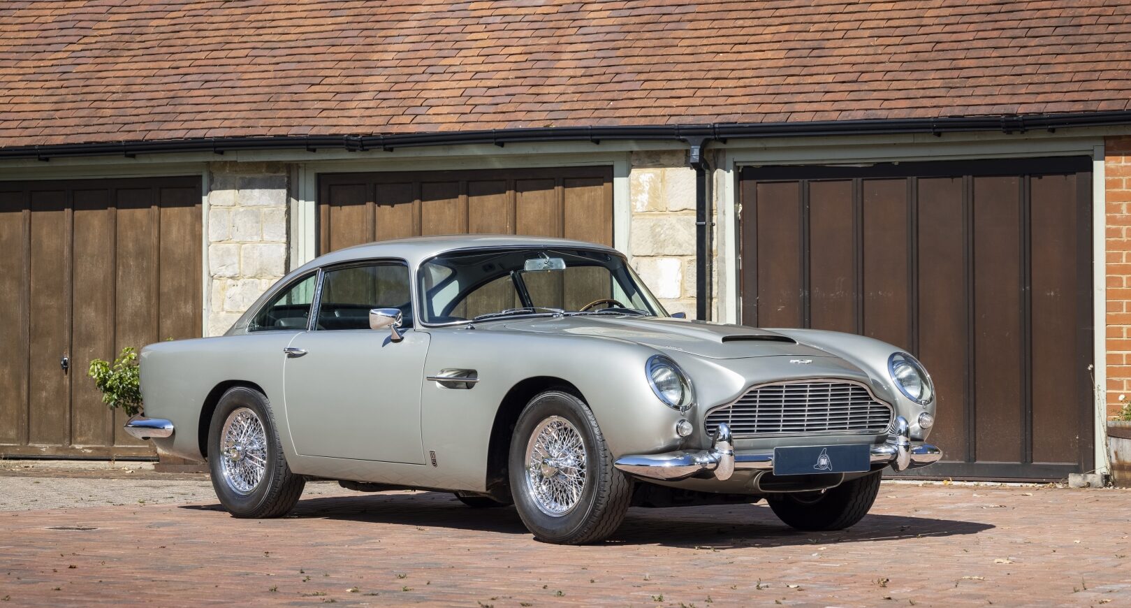 Photo of silver Aston Martin DB5