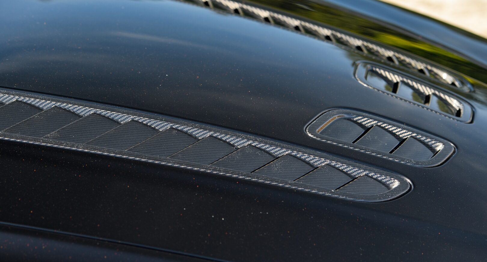 Detail photo of Aston Martin V12 Vantage bonnet