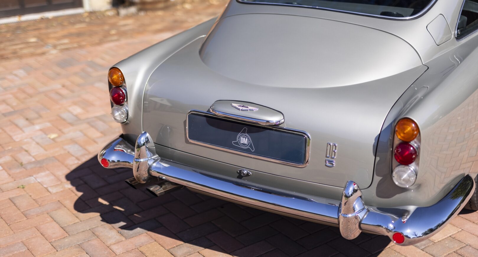 Boot of silver Aston Martin DB5