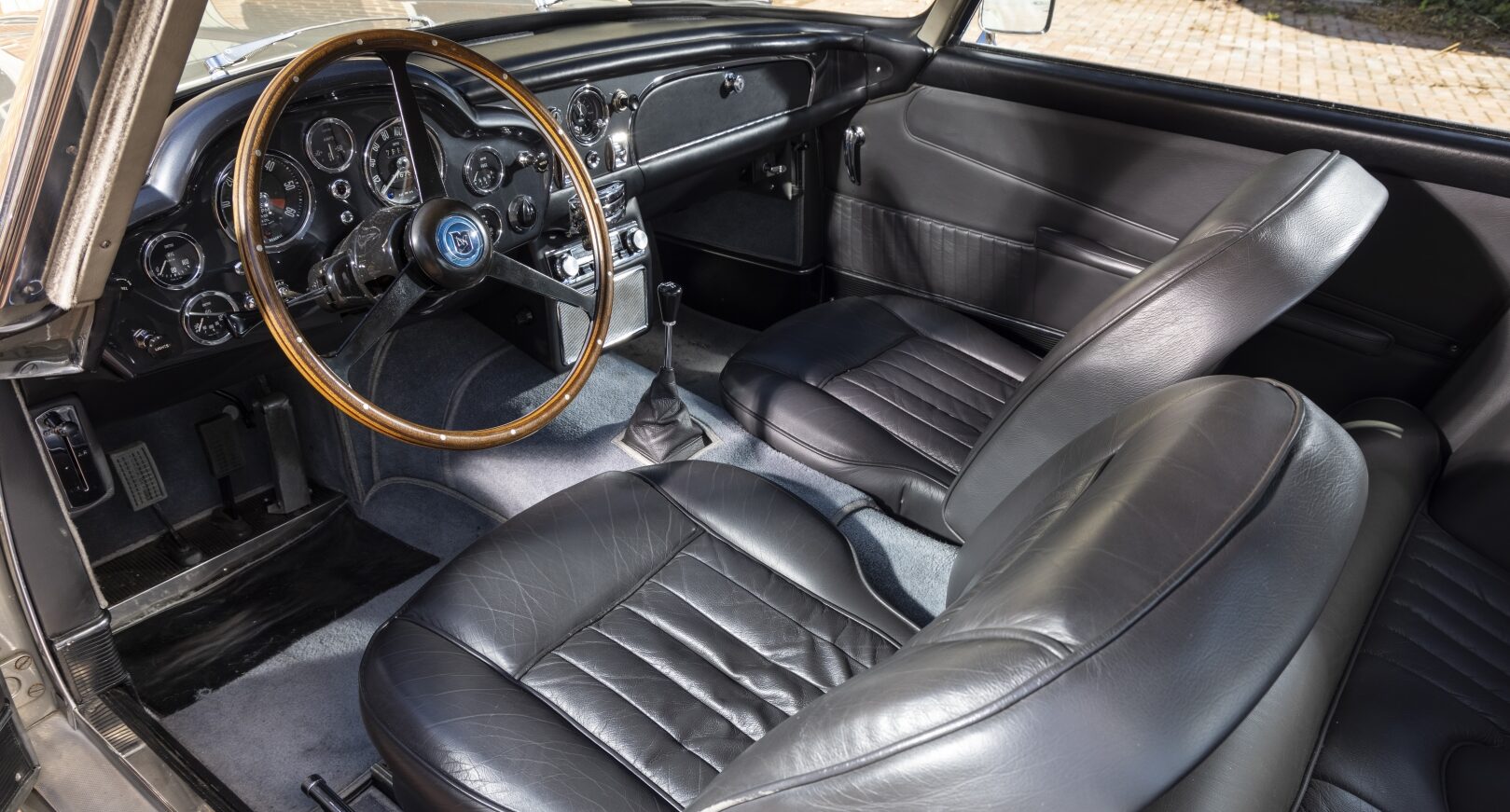 Interior of silver Aston Martin DB5