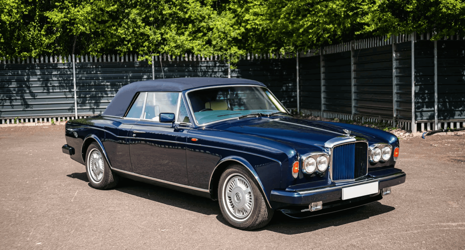 Photo of royal blue Bentley Continental Convertible