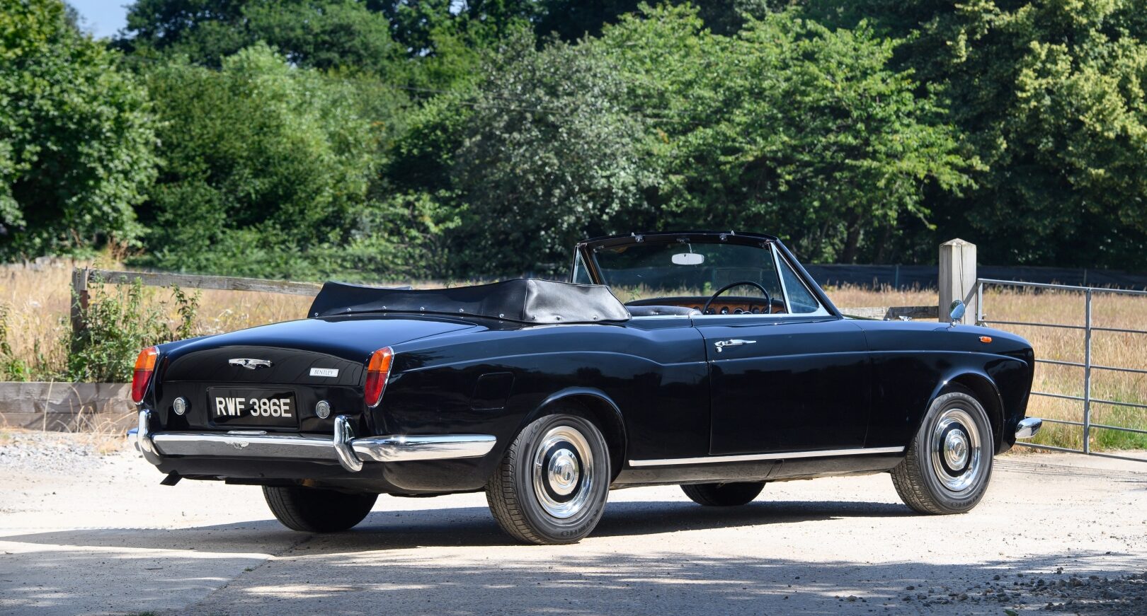 Side view of Bentley Mulliner Park Ward Convertible with hood down