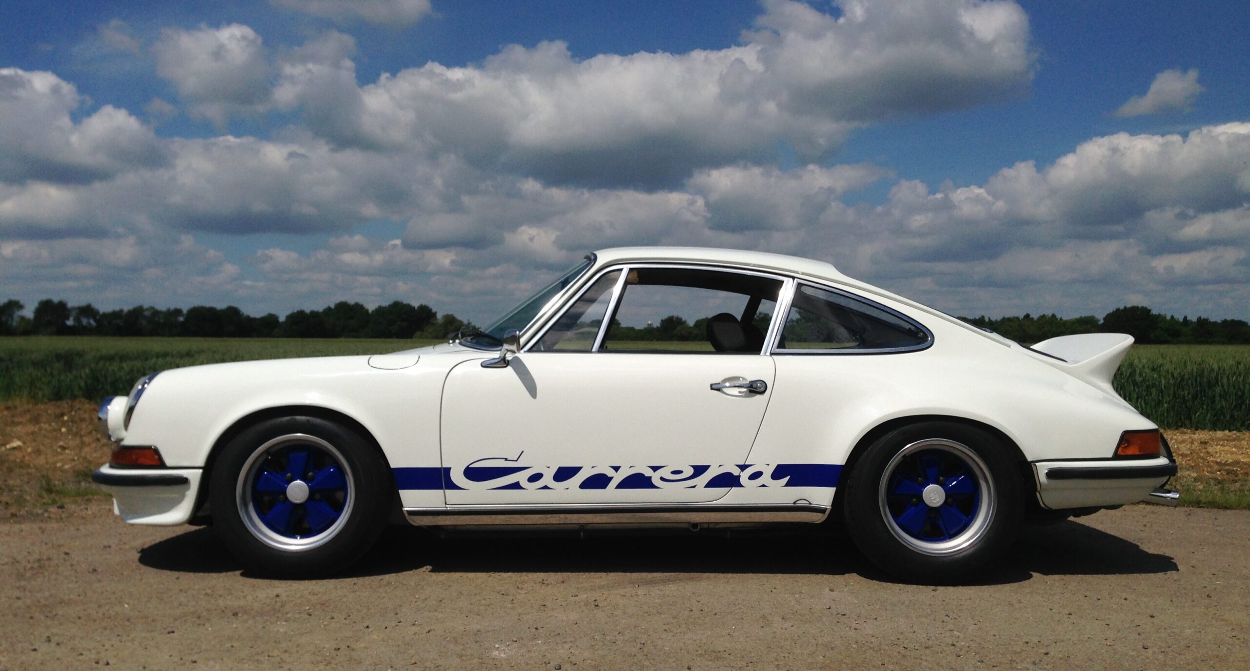 Side view of collectible 1973 Porsche 911 2.7 RS Touring