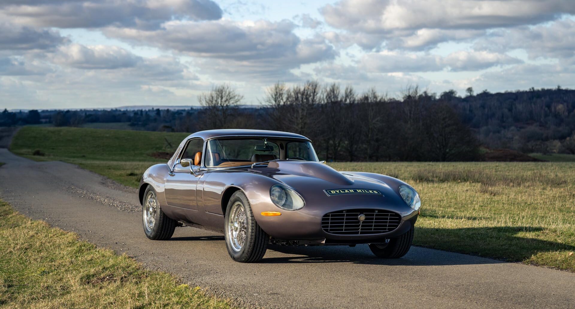 Side view of 1974 Jaguar V12 E Type Roadster - 6.2 Litre with hard top