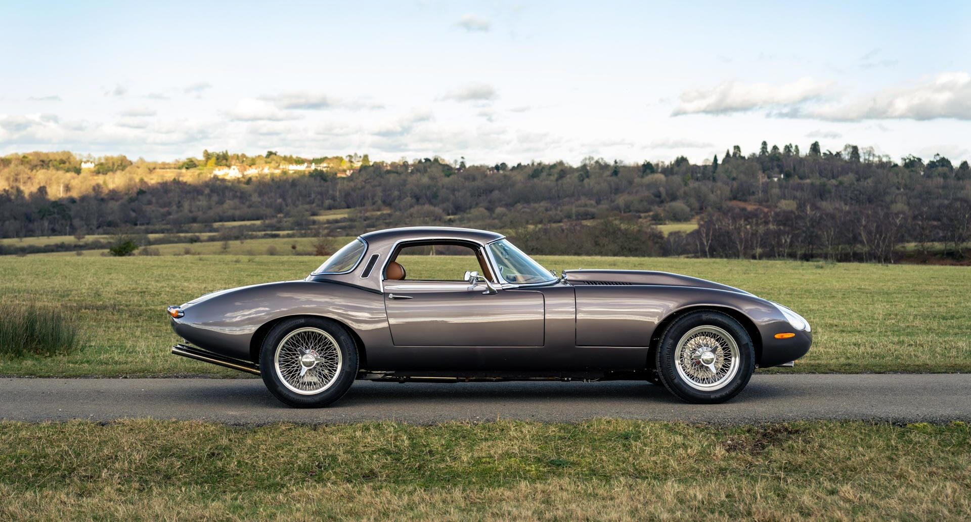 Side view of 1974 Jaguar V12 E Type Roadster - 6.2 Litre with hard top